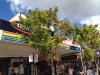 bourbong-st-old-signage-hidden-behind-tree